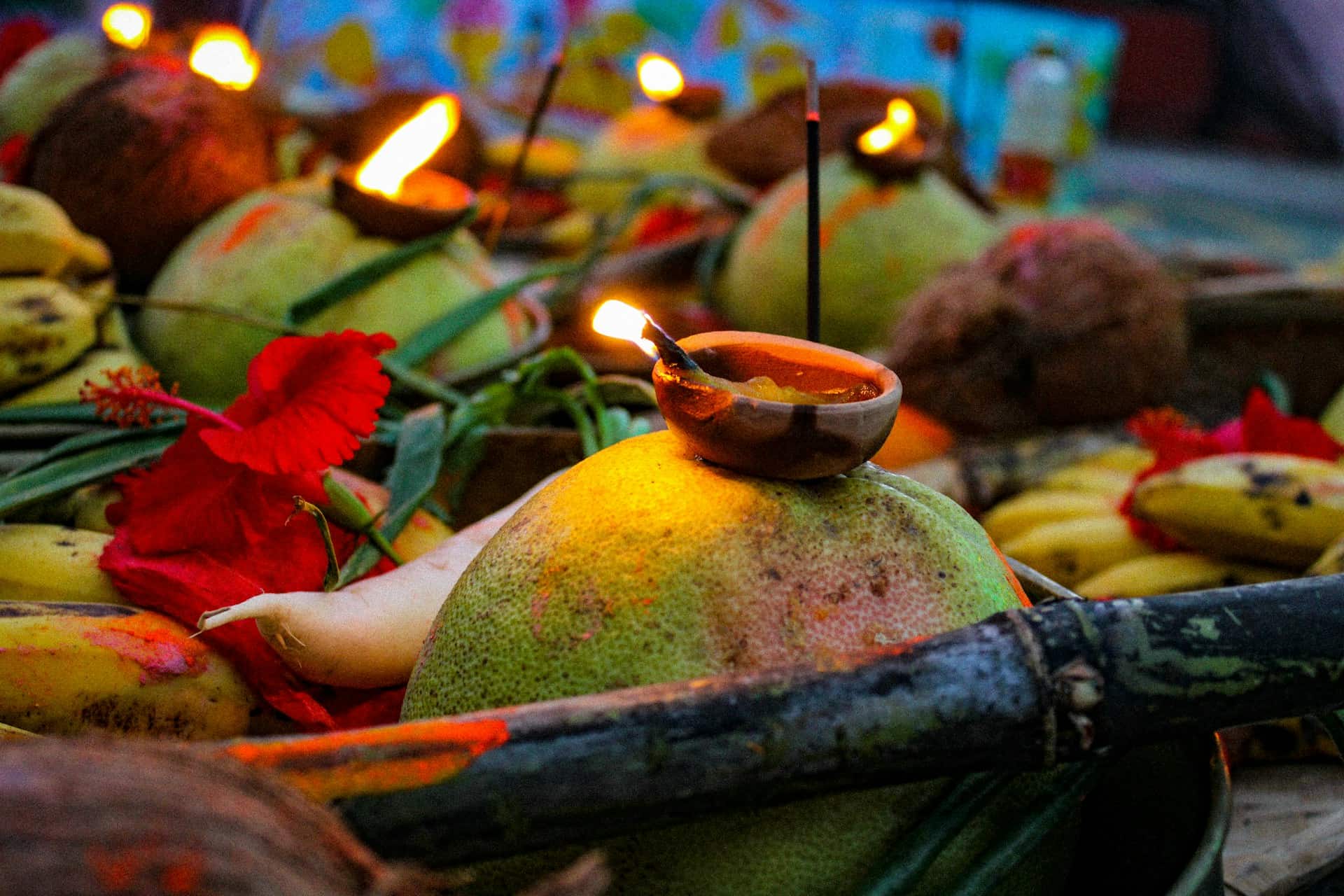 Lighting Diyos on Trays for Worship During Chhath Festival